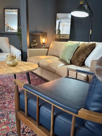 Perry's Home Furnishings & Design showroom with leather sofa and chairs