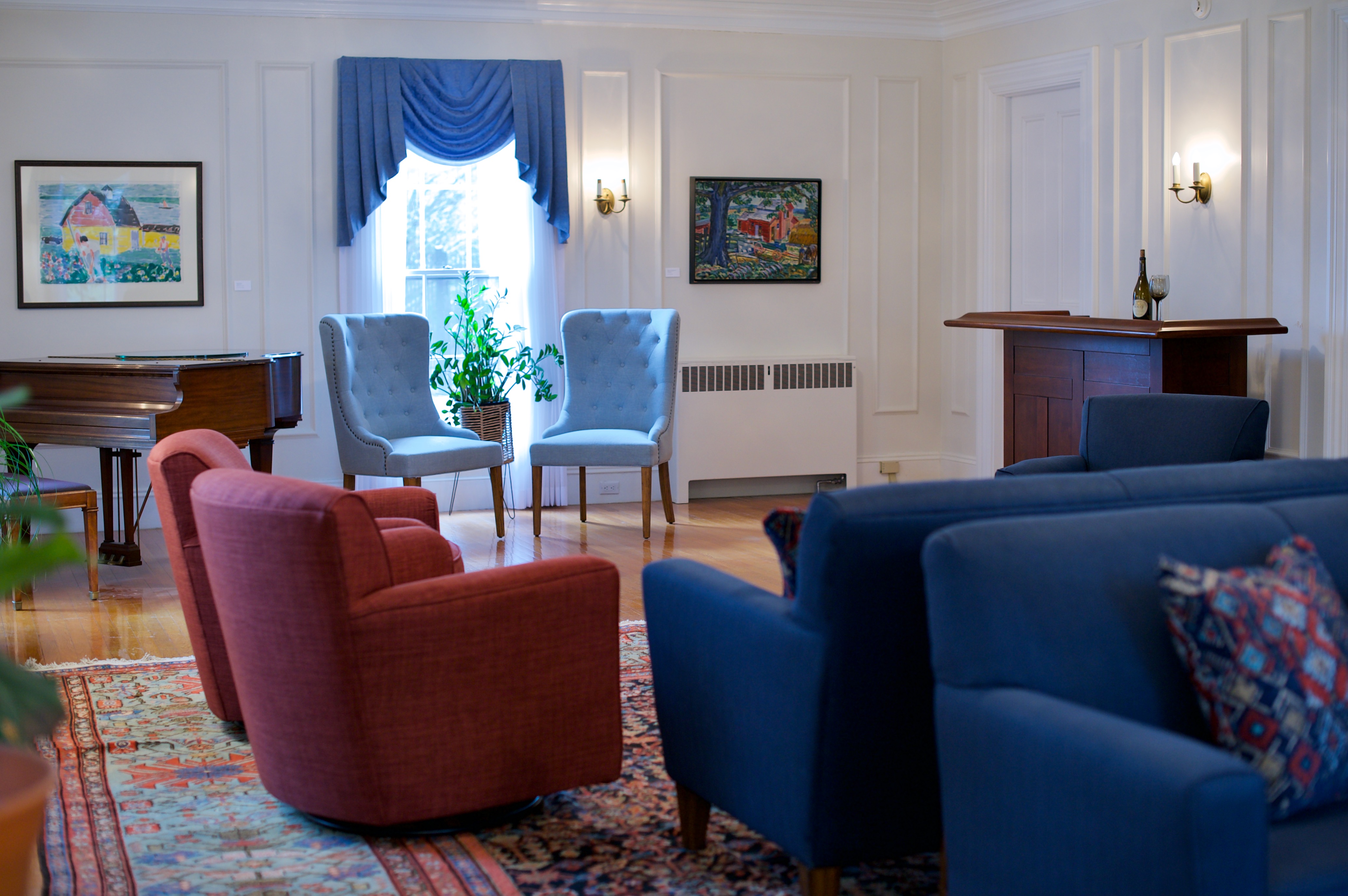 Red and blue chairs at the University of Maine Orono campus designed by Perry's Home Furnishings & Design.