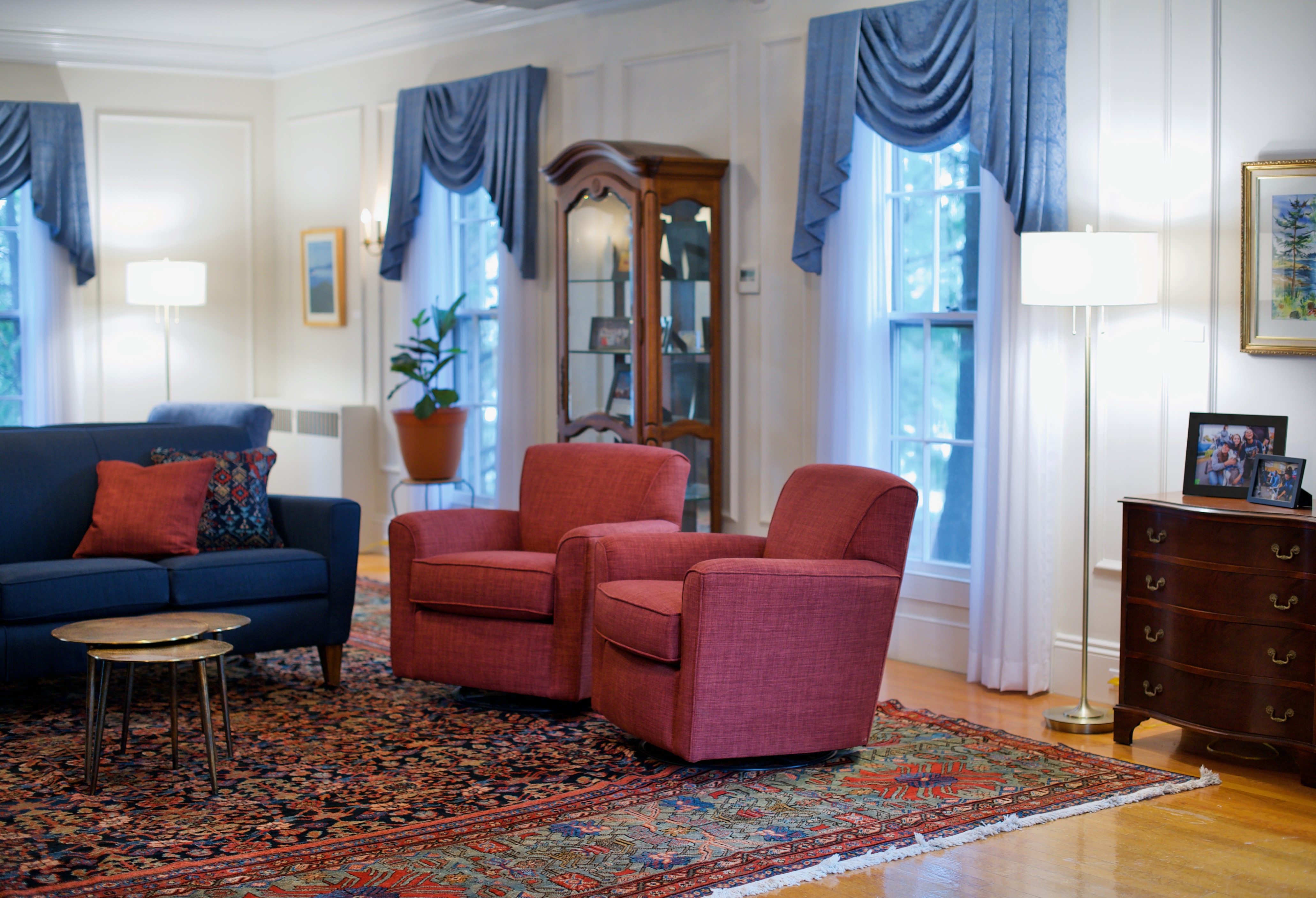 Two red chairs at the University of Maine Orono campus designed by Perry's Home Furnishings & Design.